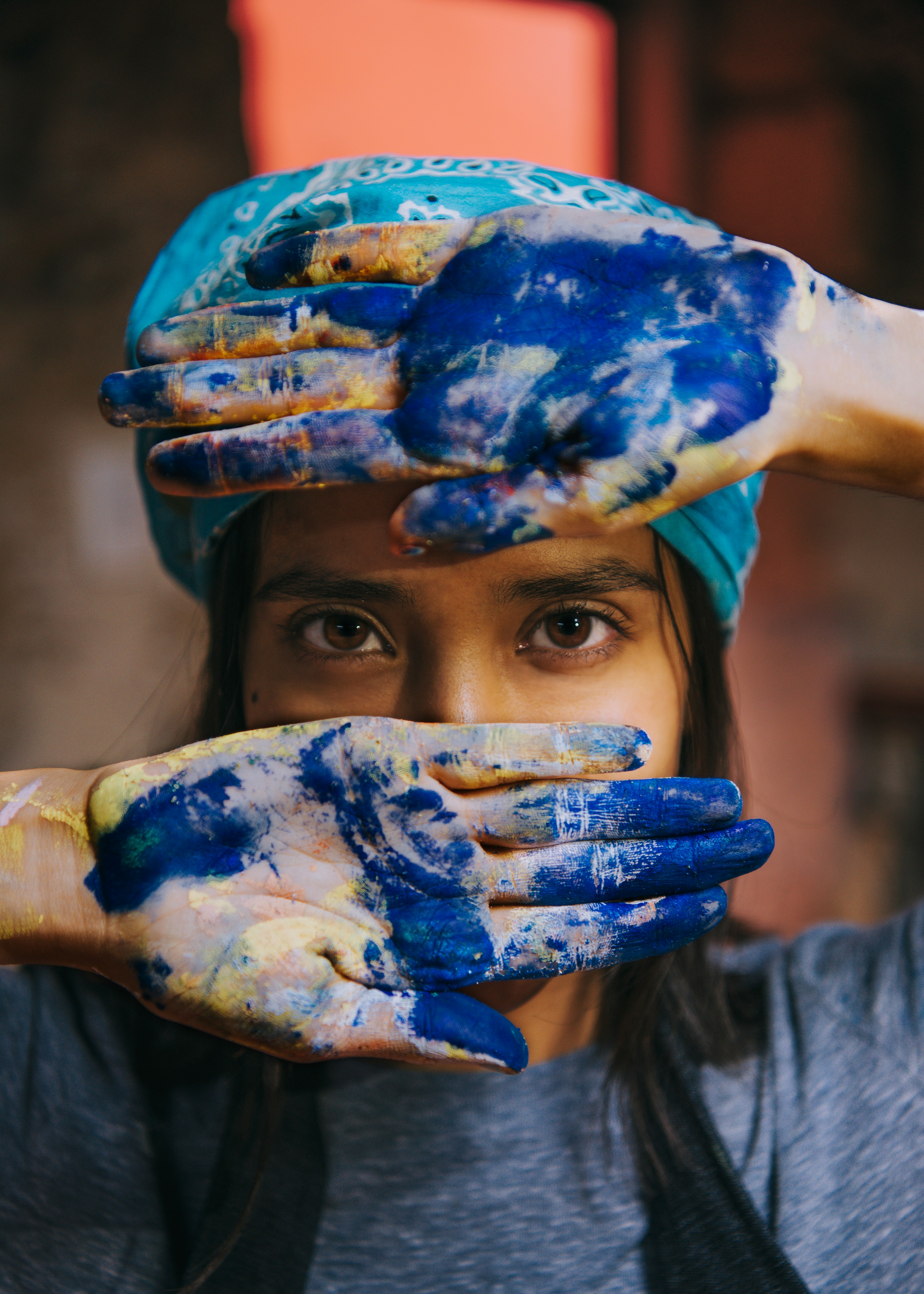 person with blue paint on face